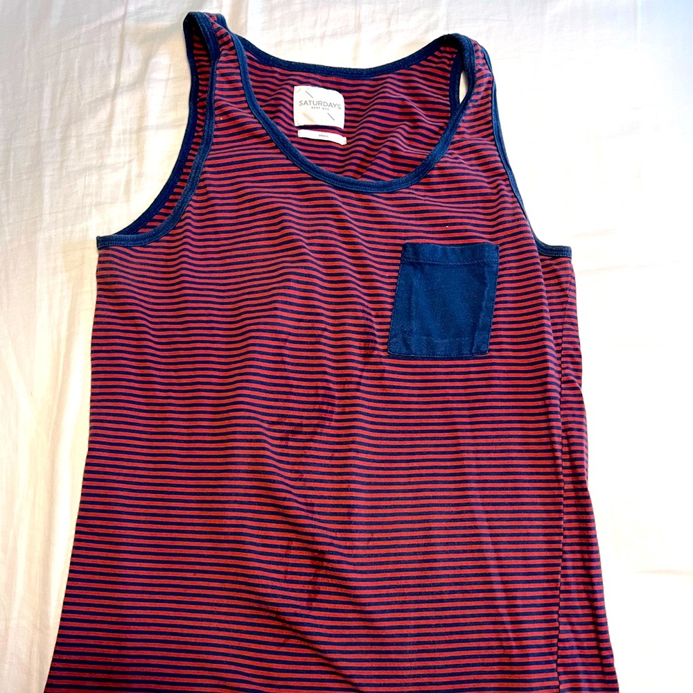 Tank top. Have pocket in front. Strip red and blue